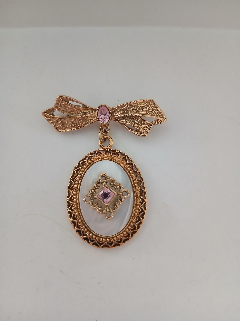 Gold-Tone Pink Stone Bow Pendant Brooch